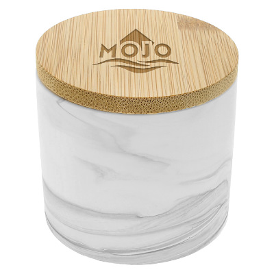 Bamboo candle with a customized imprint.