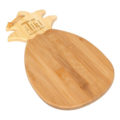 Pineapple shaped bamboo cheese board with laser engraved promotional logo.
