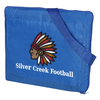 Reversible blue and black embroidered blanket.