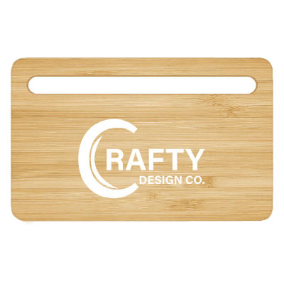 Natural bamboo charging pad with a custom logo.