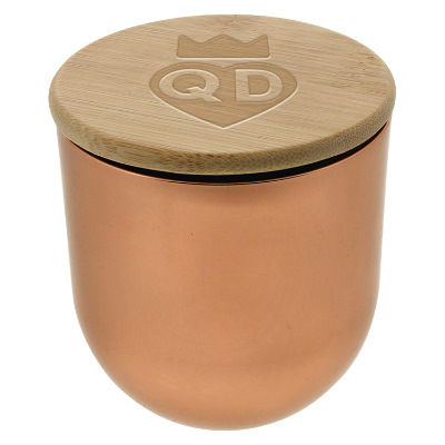 Copper glass candle with a branded logo.
