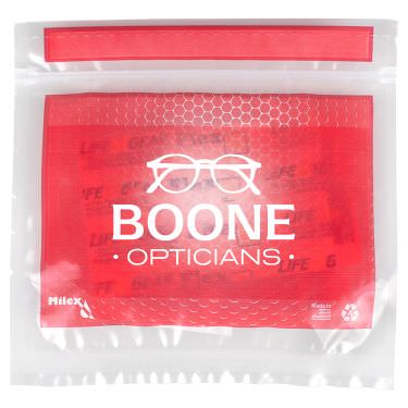 Plastic red first aid kit with a personalized imprint.