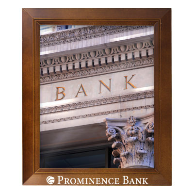 Walnut wooden picture frame with a personalized imprint.