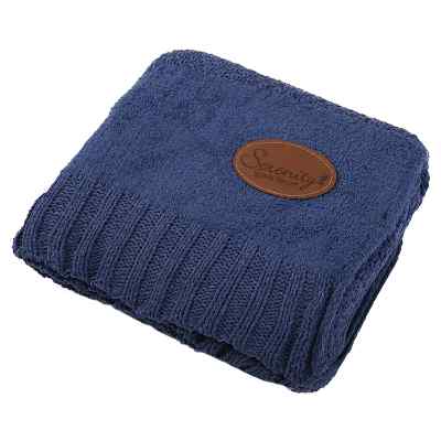 Navy blue crocheted knit blanket with debossed patch.