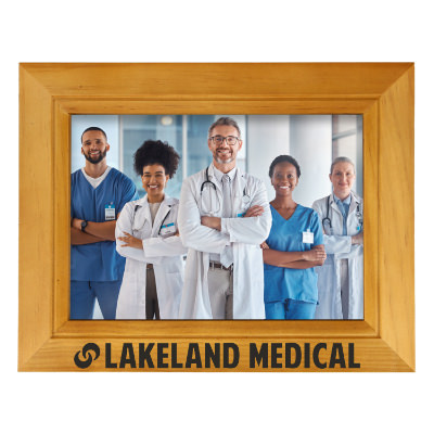 Teak wooden picture frame with a customized logo.