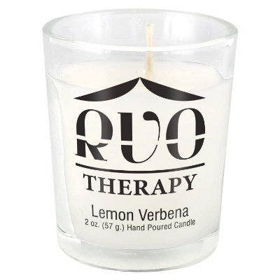Clear glass candle with a branded imprint.
