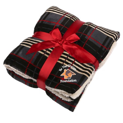 Black and gray microsherpa plaid throw blanket with logo.
