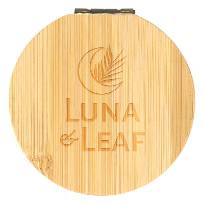 Bamboo sewing kit with a branded logo.