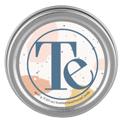 Silver tin candle with a personalized logo.