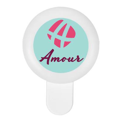 White plastic selfie light branded with your logo.