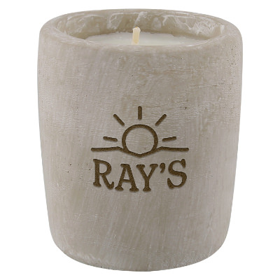 Stone candle with a custom logo.