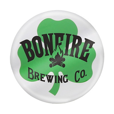 Plastic and metal green button with a custom logo.