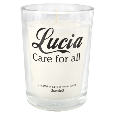 Clear glass candle with a branded imprint.