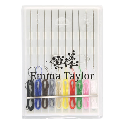 White plastic sewing kit with a personalized imprint.